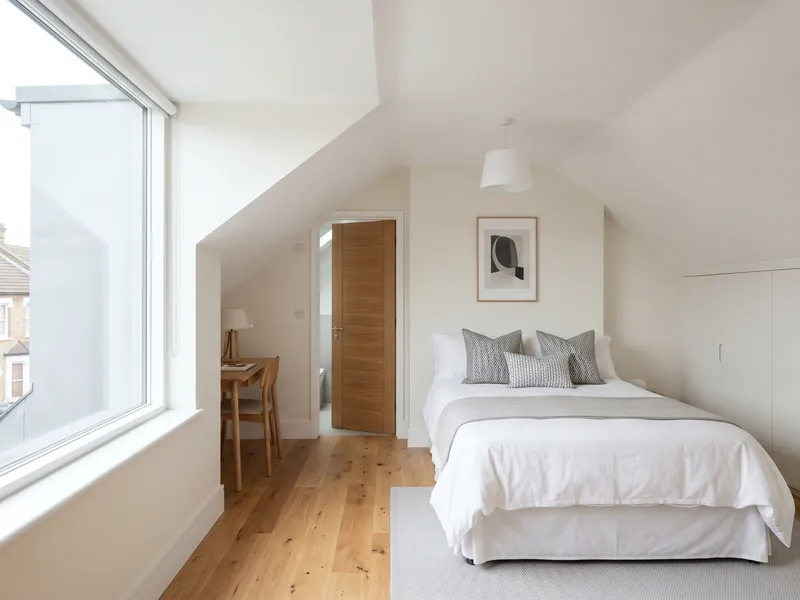 Loft conversion bedroom with dormer window